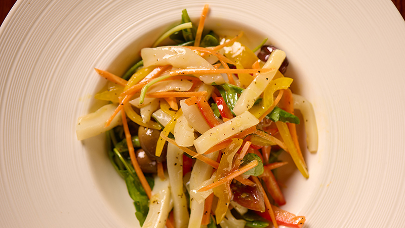 Slow cooked squid salad with seasonal vegetables and lemon juice