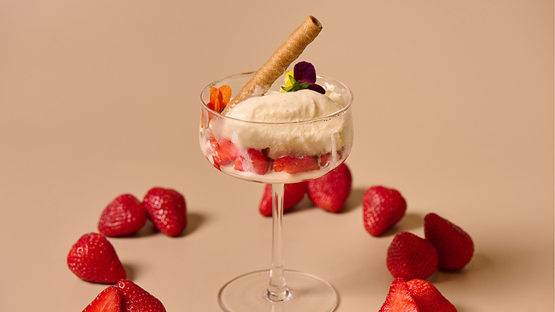 Vanilla ice cream paired with fresh strawberry salad